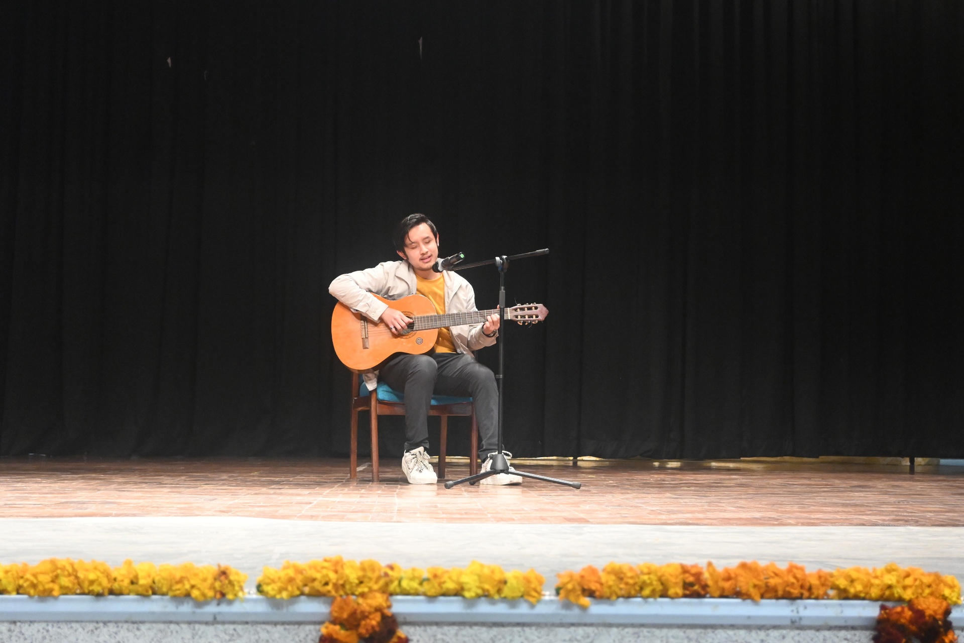 Participant playing the guitar