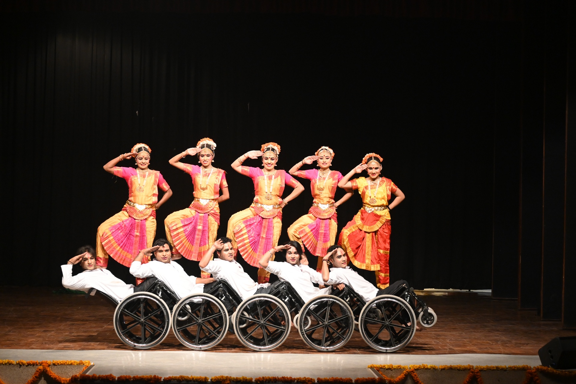 Snapshots of dance group on wheelchairs