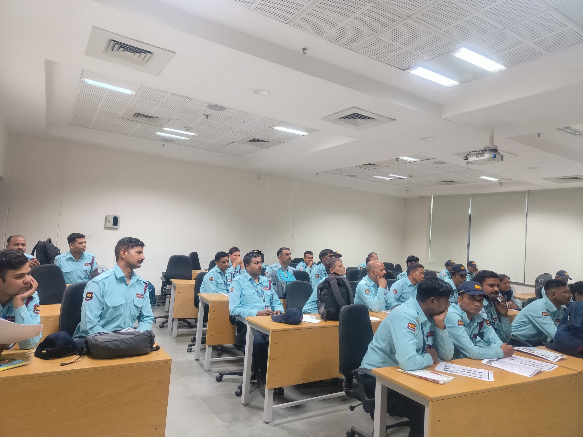 Discussion between security guards during workshop